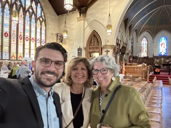 Anna Hopkins with friends at a community gathering